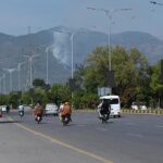Smoke rises from Margalla Hills due to a forest fire in the Federal Capital, triggering environmental concerns and emergency response efforts