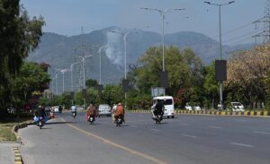 Smoke rises from Margalla Hills due to a forest fire in the Federal Capital, triggering environmental concerns and emergency response efforts