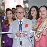 Senator Irfan-ul-Haq Siddiqui inaugurating an exhibition during International Conference on "Iqbal's Influence on Interfaith Dialogue and Coexistence" at Government College Woman University Faisalabad (GCWUF)