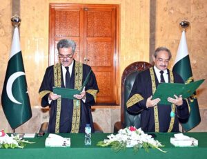 Honorable Mr. Justice Yahya Afridi, Chief Justice of Pakistan administering the oath of office to Mr. Justice Ali Baqar Najafi, Judge, Lahore High Court as Judge of the Supreme Court of Pakistan.