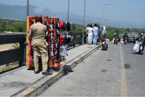 Smoke rises from Margalla Hills due to a forest fire in the Federal Capital, triggering environmental concerns and emergency response efforts