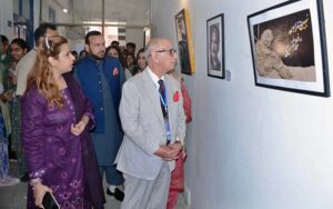 Senator Irfan-ul-Haq Siddiqui viewing after inaugurating an exhibition during International Conference on "Iqbal's Influence on Interfaith Dialogue and Coexistence" at Government College Woman University Faisalabad (GCWUF)