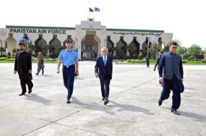 Deputy Prime Minister and Foreign Minister, Senator Mohammad Ishaq Dar shakes hand with the Acting Afghan Foreign Minister Amir Khan Muttaqi.
