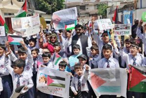 School children participating in protest demonstration to express solidarity with the people of Gaza
