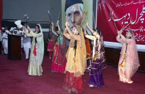 Artists perform a traditional cultural folk dance during Punjab Culture Day celebrations, organized by Punjab Arts Council Faisalabad Division
