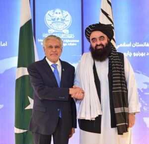 Deputy Prime Minister and Foreign Minister, Senator Mohammad Ishaq Dar shakes hand with the Acting Afghan Foreign Minister Amir Khan Muttaqi.