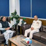 Federal Minister for Maritime Affairs, Junaid Anwar Chaudhry talking to Vice Chief of Naval Staff, Vice Admiral Ovais Ahmed Bilgrami who called on the minister at his office