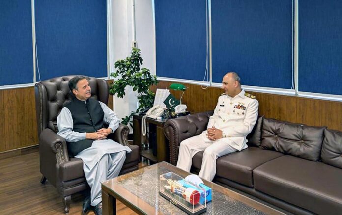Federal Minister for Maritime Affairs, Junaid Anwar Chaudhry talking to Vice Chief of Naval Staff, Vice Admiral Ovais Ahmed Bilgrami who called on the minister at his office