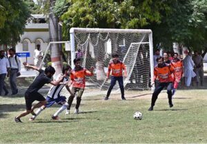 Players are in action in football match during Sports Galla at University of Sargodha