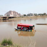 Visitors enjoy boat ride in River Chenab on 3rd day of Eid Ul Fitr celebrations
