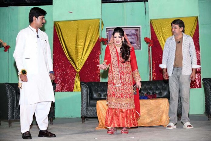 Artists performing in a Sindhi drama 