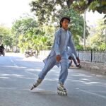 A youngster is enjoying skating in the Company Bagh