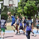 A beautiful moment as players attempt to score during the basketball match between Mass Communication and IT departments at the Sports Gala held at the University of Sargodha