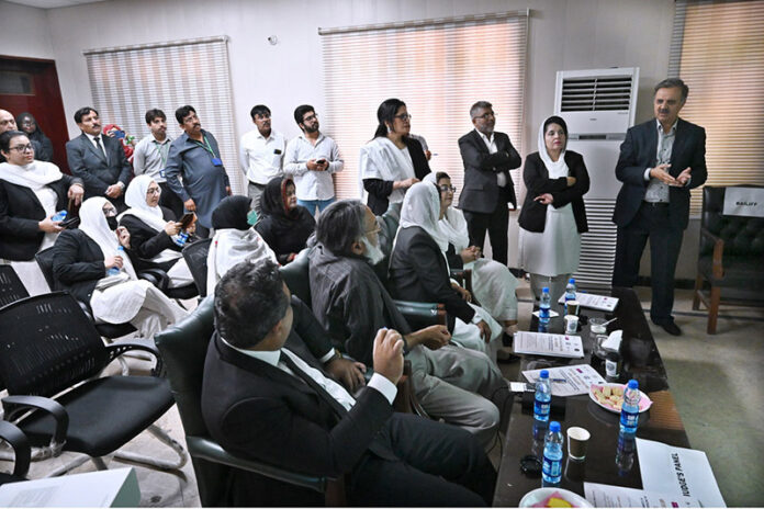 Chairman Implementation Tribunal for Newspaper Employees (ITNE) Shahid Mehmood Khokhar giving Pitch Presentations (Parallel Sessions in Three Courtrooms) during the opening ceremony of 