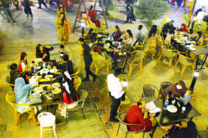 A view of large numbers of families celebrating the 3rd day of Eid-ul-fitr at a local restaurant on Jamshoro Road