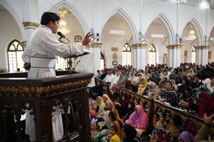 Members of the Christian community attend a solemn Good Friday Mass at St. John's Cathedral Church.