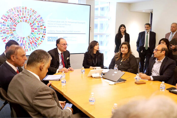 Finance Minister Senator Muhammad Aurangzeb participating in a discussion with the Pakistan Bank-Fund Staff Association regarding the country's macroeconomic indicators and structural reforms in Washington D.C