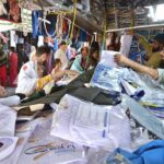 People busy in purchasing school uniform for their children at G-6 sunday bazar