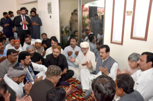Chairman Senate Syed Yusuf Raza Gilani offering fateha and expresses condolences on the death of Haji Aali Sher Bosan's younger brother at Adda Band Bosan