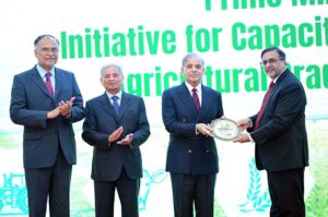Prime Minister Muhammad Shehbaz Sharif awards shields to the team of Prime Minister's initiative of sending 1000 agriculture graduates for training in China for capacity building of Agricultural Sector in Pakistan.
