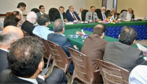 Federal Minister for Planning and Development Ahsan Iqbal addressing the business community during visit of Karachi Chamber of Commerce and Industry