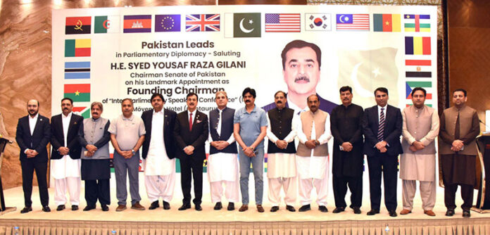 Chairman Senate, Syed Yousuf Raza Gillani in a group photo at reception hosted by him to celebrate the assumption of the exalted portfolio of Founding Chairman of Inter-Parliamentary Speaker's Conference (Isc) in the federal capital