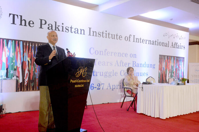 Senator (Retd) Mushahid Hussain Syed addressing at a conference on 'Seventy Years after Bandung The Struggle Continues' organised by the Pakistan Institute of International Affairs ( PIIA) at a local hotel