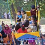 Families enjoying their holiday at Gulshan Iqbal Park