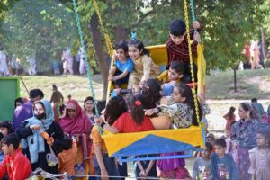 Families enjoying their holiday at Gulshan Iqbal Park