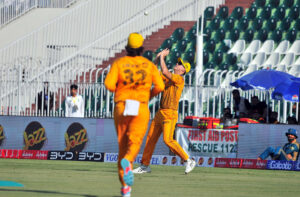 Peshawar Zalmi's Sufiyan Muqeem celebrates with teammates after the dismissal of Quetta Gladiators batter Finn Allen during the Pakistan Super League (PSL) Twenty20 cricket match between Quetta Gladiators and Peshawar Zalmi at the Rawalpindi Cricket Stadium.