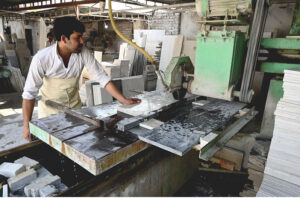 Worker busy in his routine work in a factory as the world marks 1st May as International Workers’ Day also known as Labour Day and often referred to as May Day, is a celebration of labourers and the working classes that is promoted by the international labour movement. The date was chosen in 1889 for political reasons by the Marxist International Socialist Congress, which met in Paris and established the Second International as a successor to the earlier International Workingmen’s Association. They adopted a resolution for a “Great International Demonstration” in support of working-class demands for the eight-hour day. The date had been chosen by the American Federation of Labor to continue an earlier campaign for the eight-hour day in the United States, which had been the cause of a general strike beginning on 1 May 1886, and culminated in the Haymarket affair, which occurred in Chicago four days later. May Day subsequently became an annual event