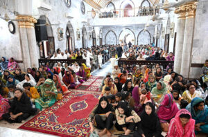 Christians worship at Don Bosco Church during Good Friday prayers.