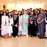 A group photo of students from National Defence University Islamabad dur