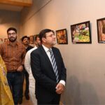 Vice Chancellor University of Sargodha Professor Dr. Qaiser Abbas visiting after inaugurating photo exhibition the assignment of students on labour Day at Zubeida Agha Art Gallery at University of Sargodha