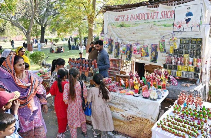 A vendor displaying handmade clay toys to attract children at Mohenjo-Daro