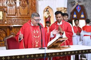 Christians worship at Don Bosco Church during Good Friday prayers.