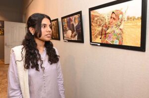 Vice Chancellor University of Sargodha Professor Dr. Qaiser Abbas visiting after inaugurating photo exhibition the assignment of students on labour Day at Zubeida Agha Art Gallery at University of Sargodha