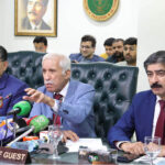 Federal Minister for Board of Investment Qaiser Ahmed Sheikh addresses members during his visit to the Lahore Chamber of Commerce and Industry