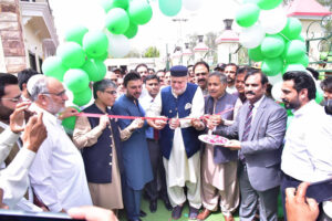 Federal Minister for Poverty Alleviation and Social Safety Syed Imran Ahmed Shah cutting the ribbon at the inaugural ceremony of SWSSC.