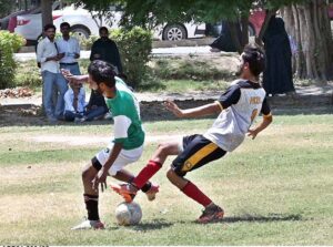 Players in action during the final football match between the Agriculture College and the Sports Science Department on the Sports Gala held at the University of Sargodha