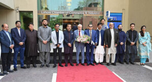 Federal Minister for Board of Investment Qaiser Ahmed Sheikh addresses members during his visit to the Lahore Chamber of Commerce and Industry