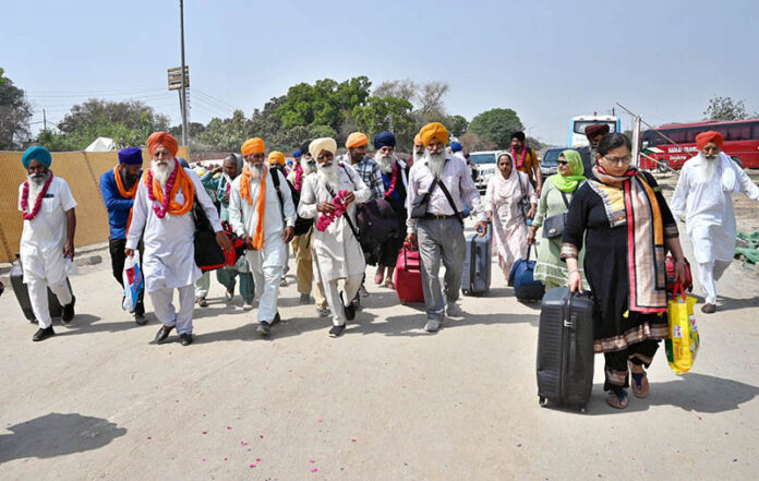 Arrival of Sikh pilgrims in Pakistan through the Wagah Border to attend Vaisakhi Festival and Khalsa Birth Anniversary Celebrations
