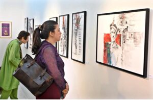 An art lover visits the art exhibition “Rekingdling: The Kalash Narrative,” by six accomplished artists, Ahmed Habib, Akram Dost Baloch, Ejaz Khan, M.A.Bhatti, Riffat Khattak and Samreen Asif organized by Pakistan National Council of the Arts in collaboration with Nomad Gallery at Gallery 06 in PNCA