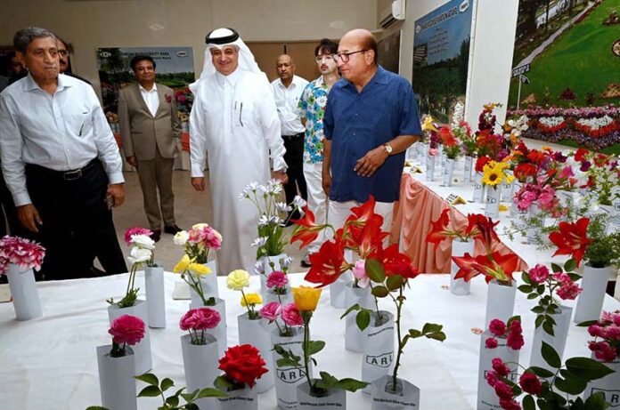 H.E. Ambassador of Saudi Arabia Nawaf bin Saeed Al-Maliki and CEO of Attock Group of Companies Shoaib A. Malik visit and appreciate the flower display at the 76th Annual Flower Show 2025 organized by Attock Oil Group at Morgah Club