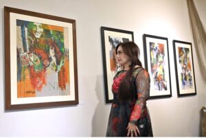 An art lover visits the art exhibition “Rekingdling: The Kalash Narrative,” by six accomplished artists, Ahmed Habib, Akram Dost Baloch, Ejaz Khan, M.A.Bhatti, Riffat Khattak and Samreen Asif organized by Pakistan National Council of the Arts in collaboration with Nomad Gallery at Gallery 06 in PNCA
