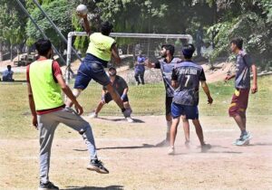 Players exert their full strength as they pull the rope during the final tug-of-war competition between the Sociology Department and the Sports Science Department at the University of Sargodha's Sports Gala