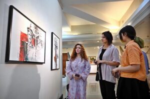 An art lover visits the art exhibition “Rekingdling: The Kalash Narrative,” by six accomplished artists, Ahmed Habib, Akram Dost Baloch, Ejaz Khan, M.A.Bhatti, Riffat Khattak and Samreen Asif organized by Pakistan National Council of the Arts in collaboration with Nomad Gallery at Gallery 06 in PNCA