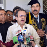 Federal Minister for Energy Sardar Owais Ahmed Khan Leghari talking to the media