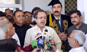 Federal Minister for Energy Sardar Owais Ahmed Khan Leghari talking to the media