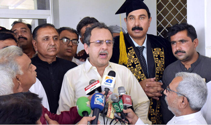 Federal Minister for Energy Sardar Owais Ahmed Khan Leghari talking to the media